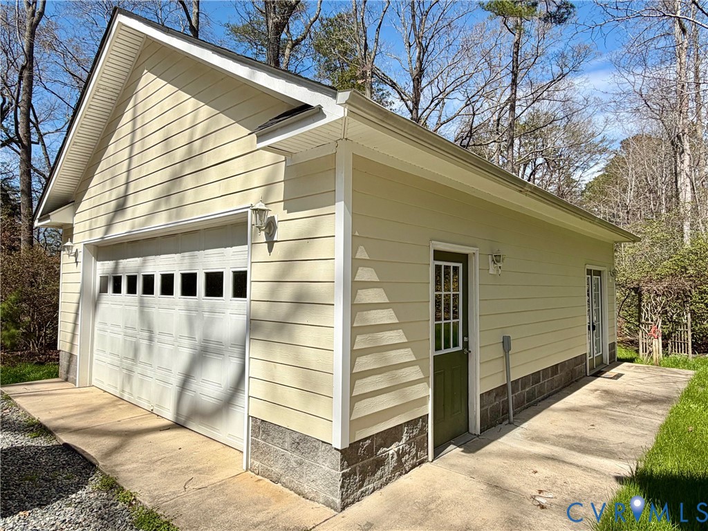 43 Ruddy Duck Road Heathsville, VA 22473 - Photo 35 of 46 a view of a house with a yard