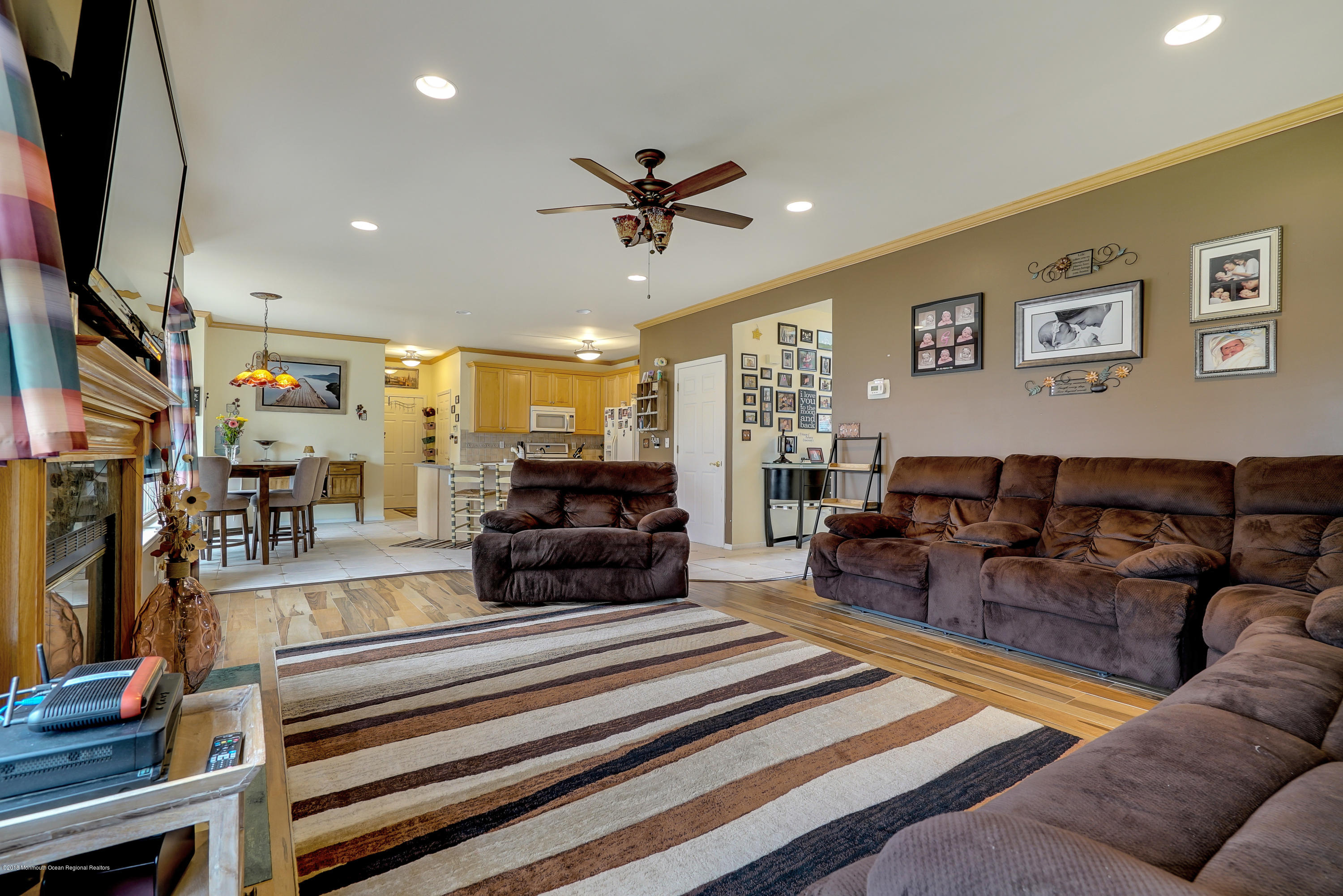 14 Judy Road Eatontown, NJ 07724 - Photo 13 of 38 a living room with furniture a rug and a chandelier