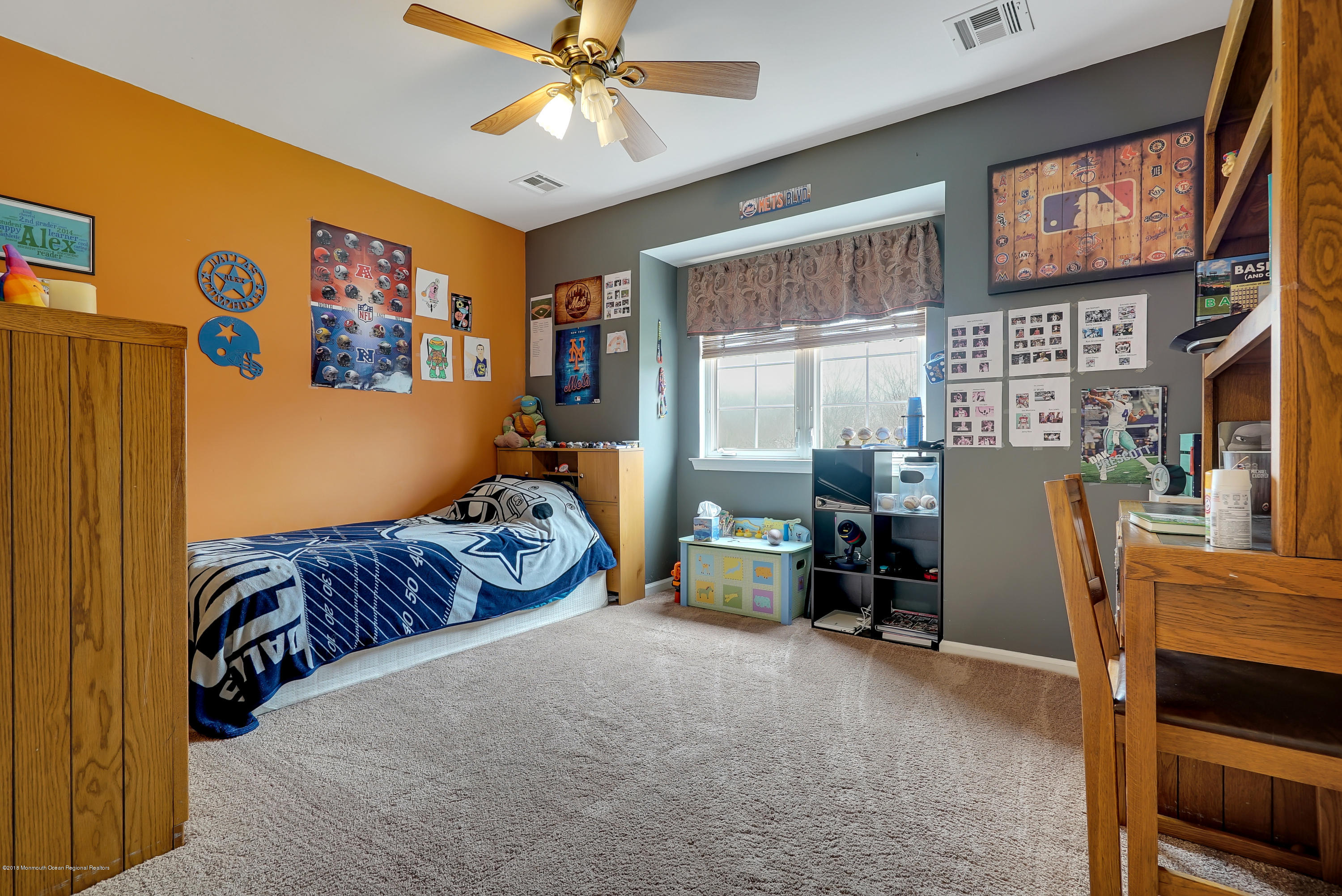 14 Judy Road Eatontown, NJ 07724 - Photo 22 of 38 a bedroom with a bed and a chandelier
