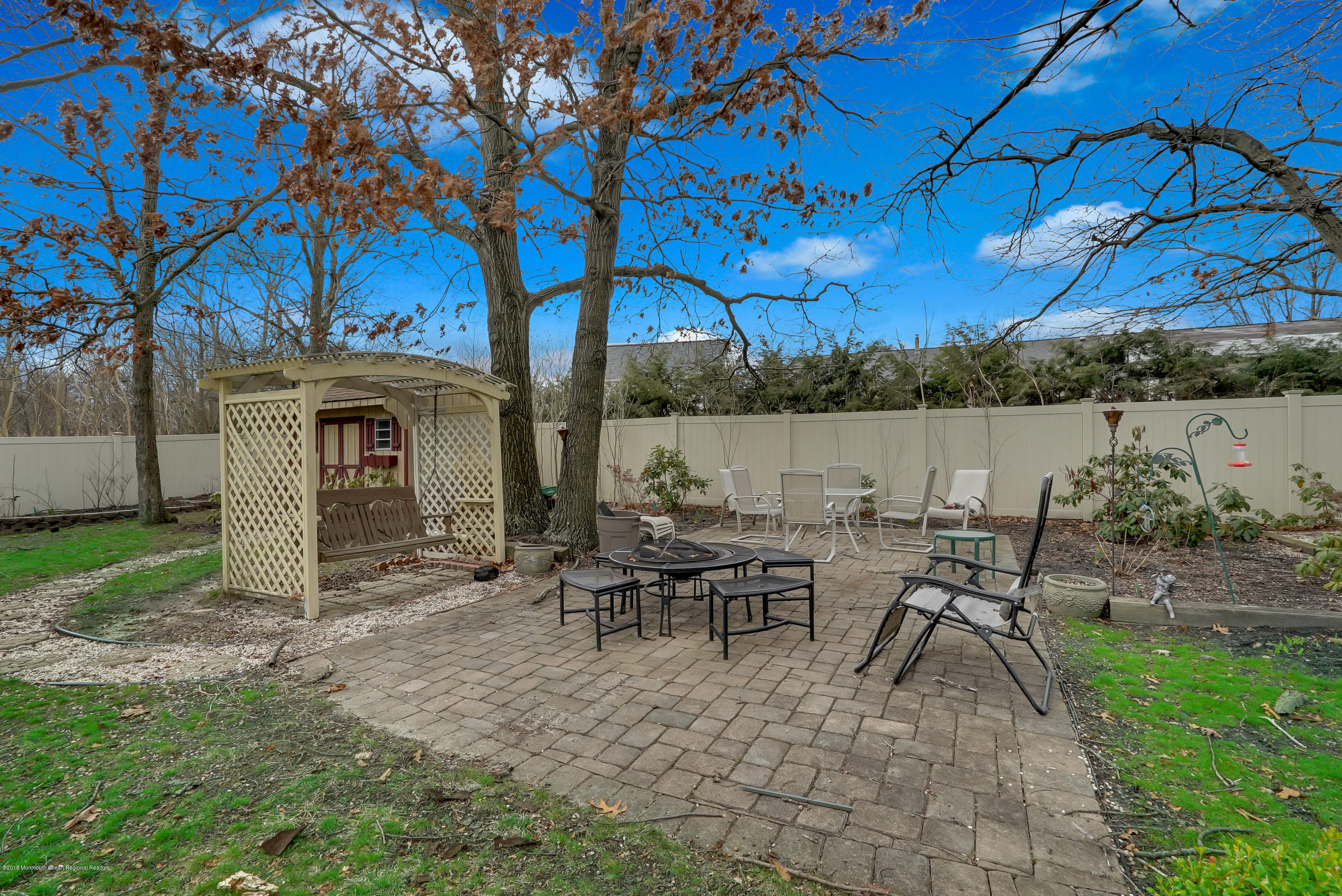 14 Judy Road Eatontown, NJ 07724 - Photo 35 of 38 a view of a patio with chairs and a table