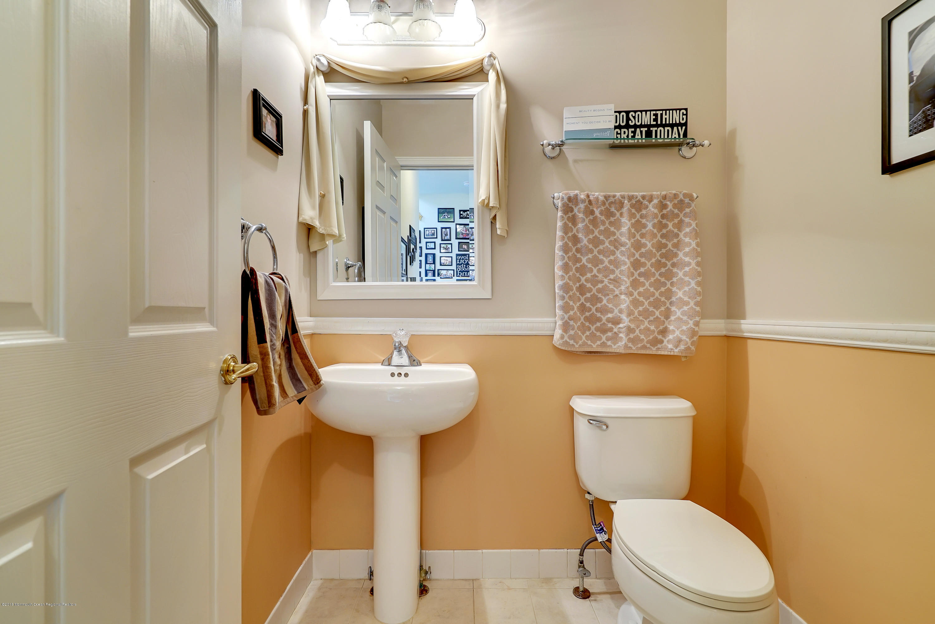 14 Judy Road Eatontown, NJ 07724 - Photo 10 of 38 a bathroom with a toilet sink and mirror
