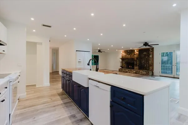 a bedroom with a large bed and a flat screen tv