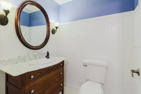 a bathroom with a tub and a sink