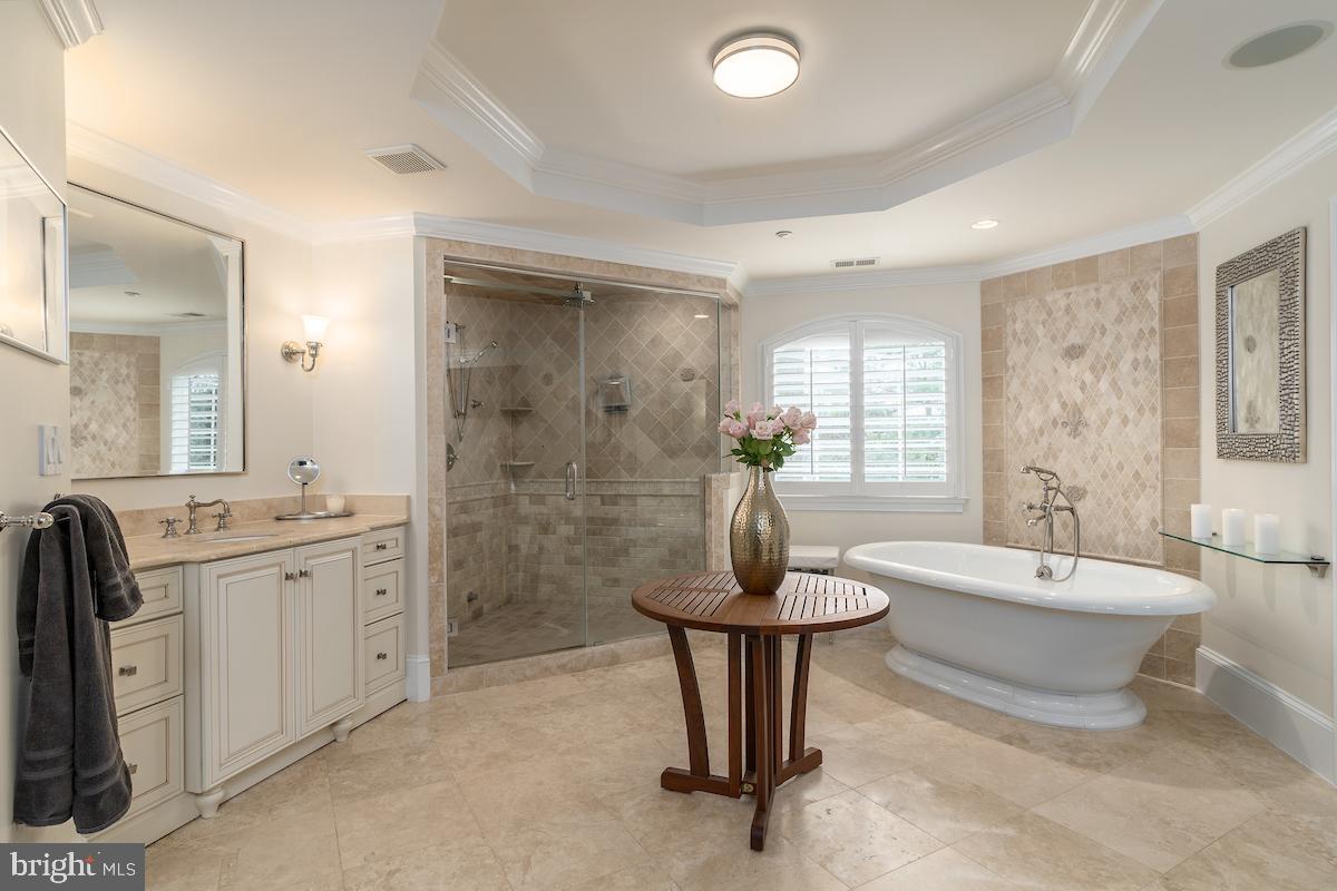 7803 Radnor Road Bethesda, MD 20817 - Photo 23 of 51 Freestanding cast iron tub, oversized shower