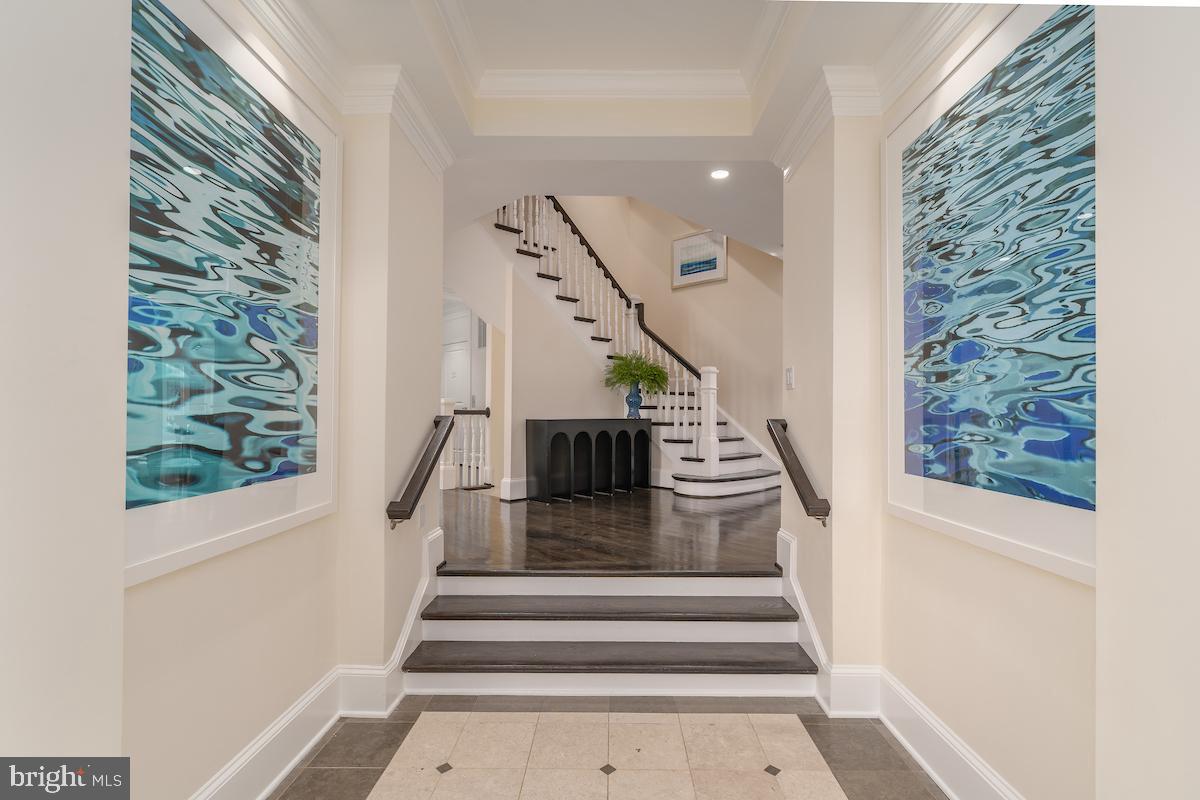 7803 Radnor Road Bethesda, MD 20817 - Photo 3 of 51 A marble floor in the foyer sets the tone