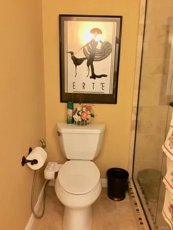 a bathroom with a toilet and a sink