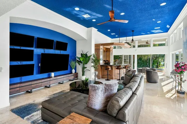 a bathroom with a sink a vanity a mirror and a shower