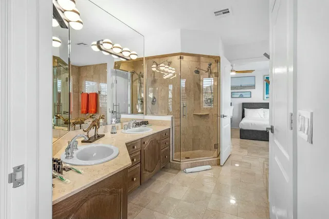 a bathroom with a bathtub and a shower
