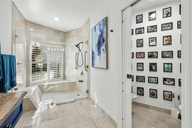 a view of a lake with houses in the back