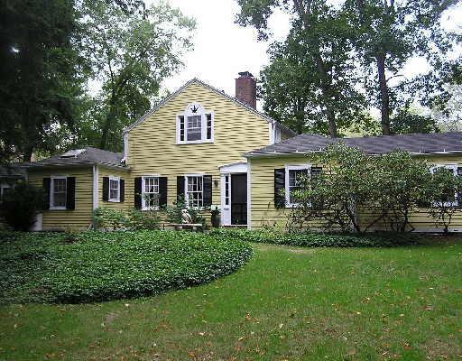 92 West Redding Road Danbury, CT 06810 - Photo 1 of 1 a front view of a house with a garden