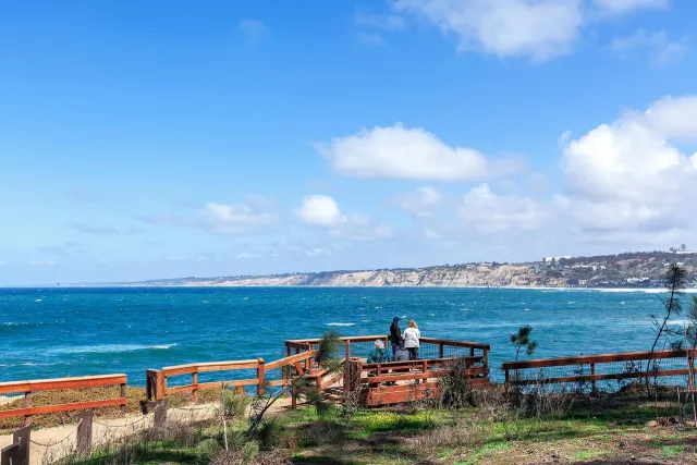 a view of a city with an ocean view