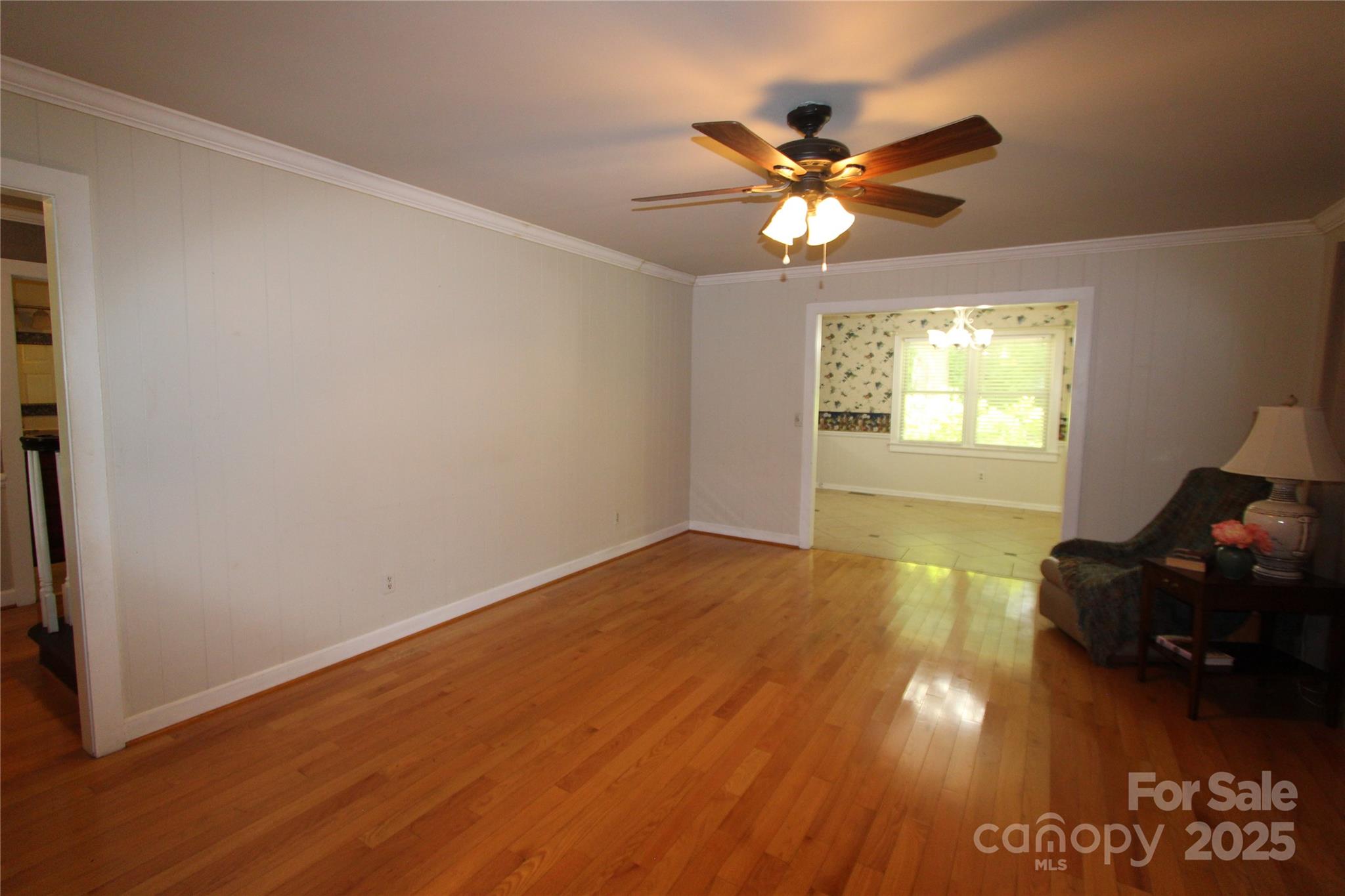 344 Lucas Road Star, NC 27356 - Photo 12 of 32 a view of a livingroom with a window and wooden floor