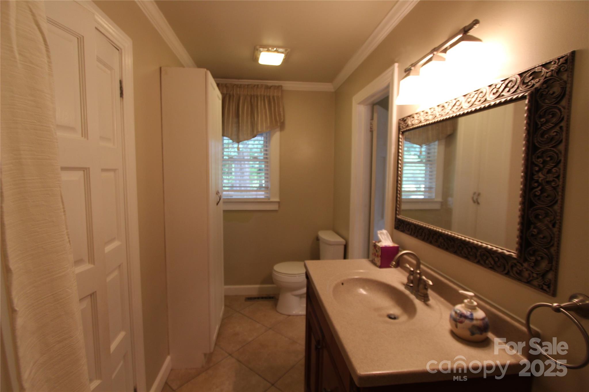 344 Lucas Road Star, NC 27356 - Photo 23 of 32 a bathroom with a sink vanity granite and a mirror