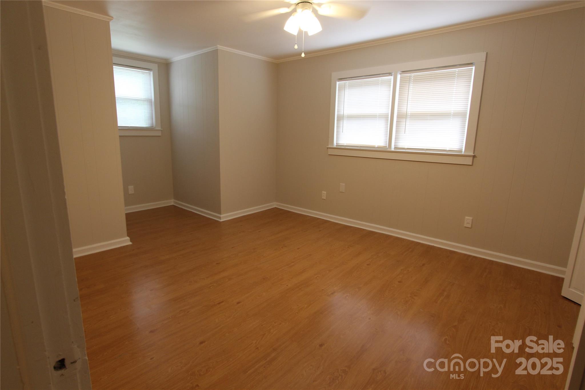 344 Lucas Road Star, NC 27356 - Photo 28 of 32 an empty room with windows and closet