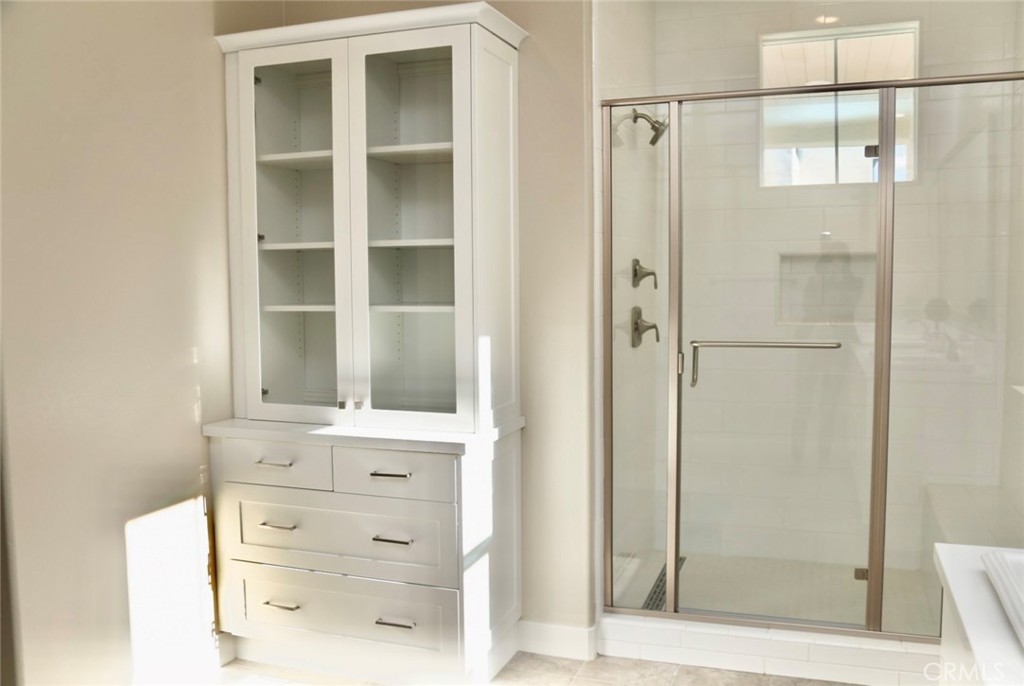 109 Pitch Irvine, CA 92618 - Photo 4 of 14 a bathroom with a shower and a mirror