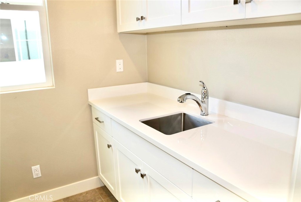 109 Pitch Irvine, CA 92618 - Photo 9 of 14 a utility room with dryer and washer