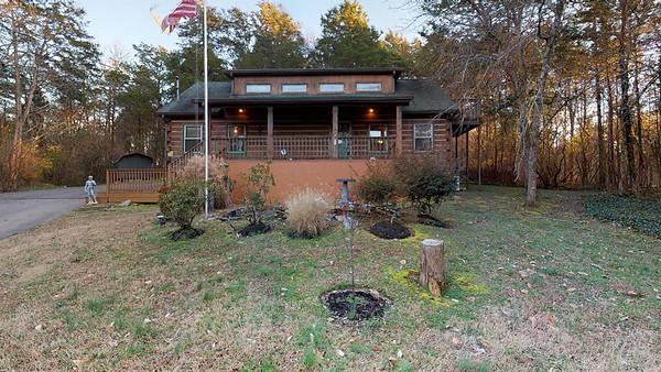 80 Spring Valley Drive Mount Juliet, TN 37122 - Photo 1 of 28 a view of a backyard with plants and large tree
