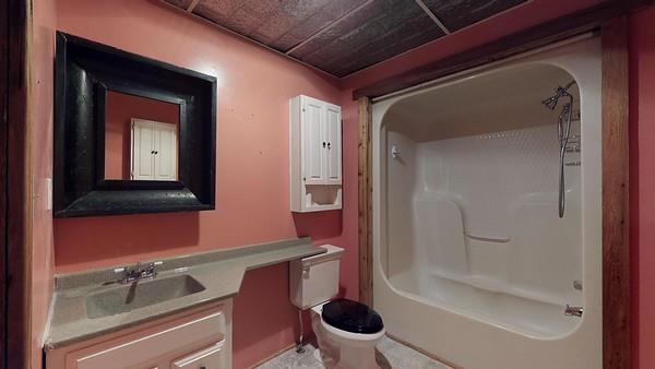 80 Spring Valley Drive Mount Juliet, TN 37122 - Photo 17 of 28 a bathroom with a toilet sink and shower