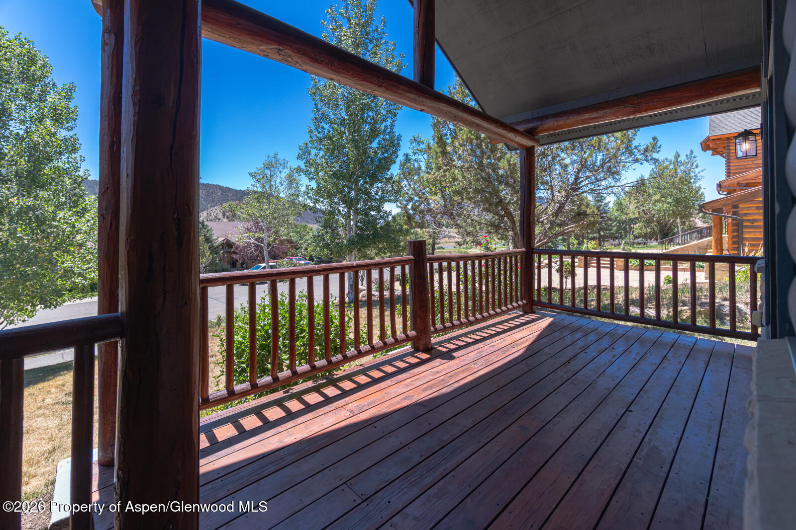 316 Faas Ranch Road New Castle, CO 81647 - Photo 7 of 50 a view of a two room with wooden floor and balcony