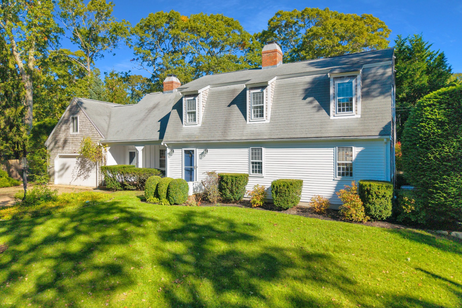 28 Pine Tree Lane Vineyard Haven, MA 02568 - Photo 1 of 61 front view of a house with a yard