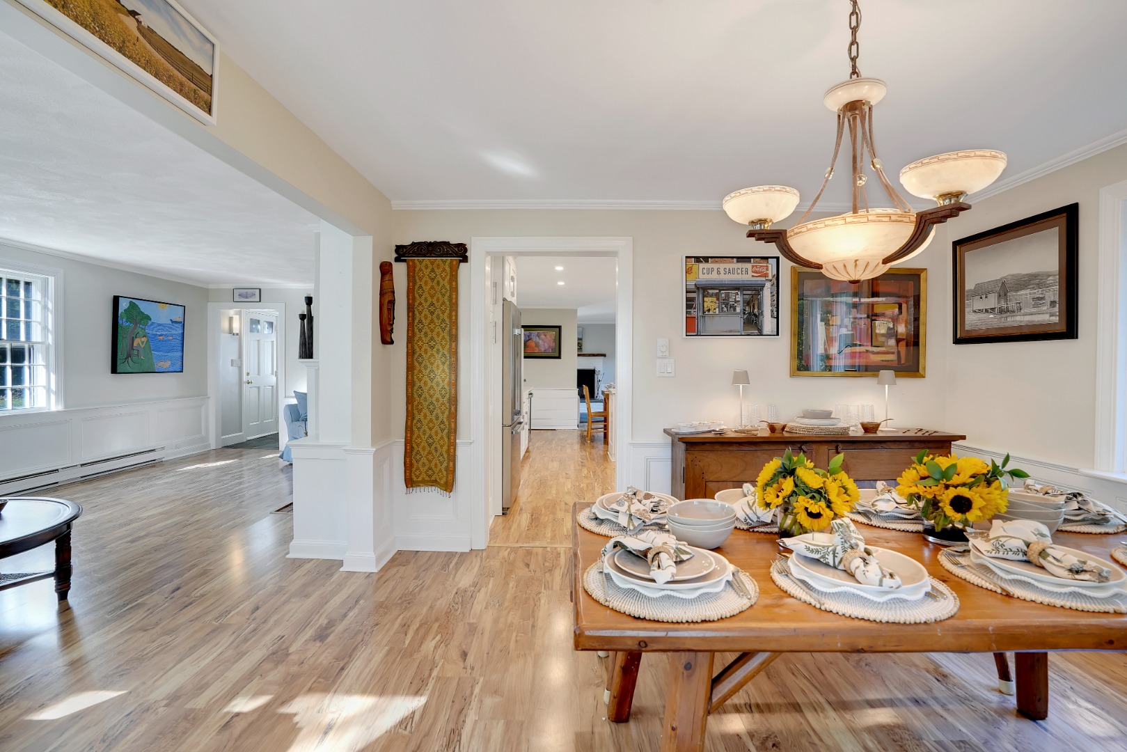 28 Pine Tree Lane Vineyard Haven, MA 02568 - Photo 12 of 61 a view of a dining room with furniture and wooden floor