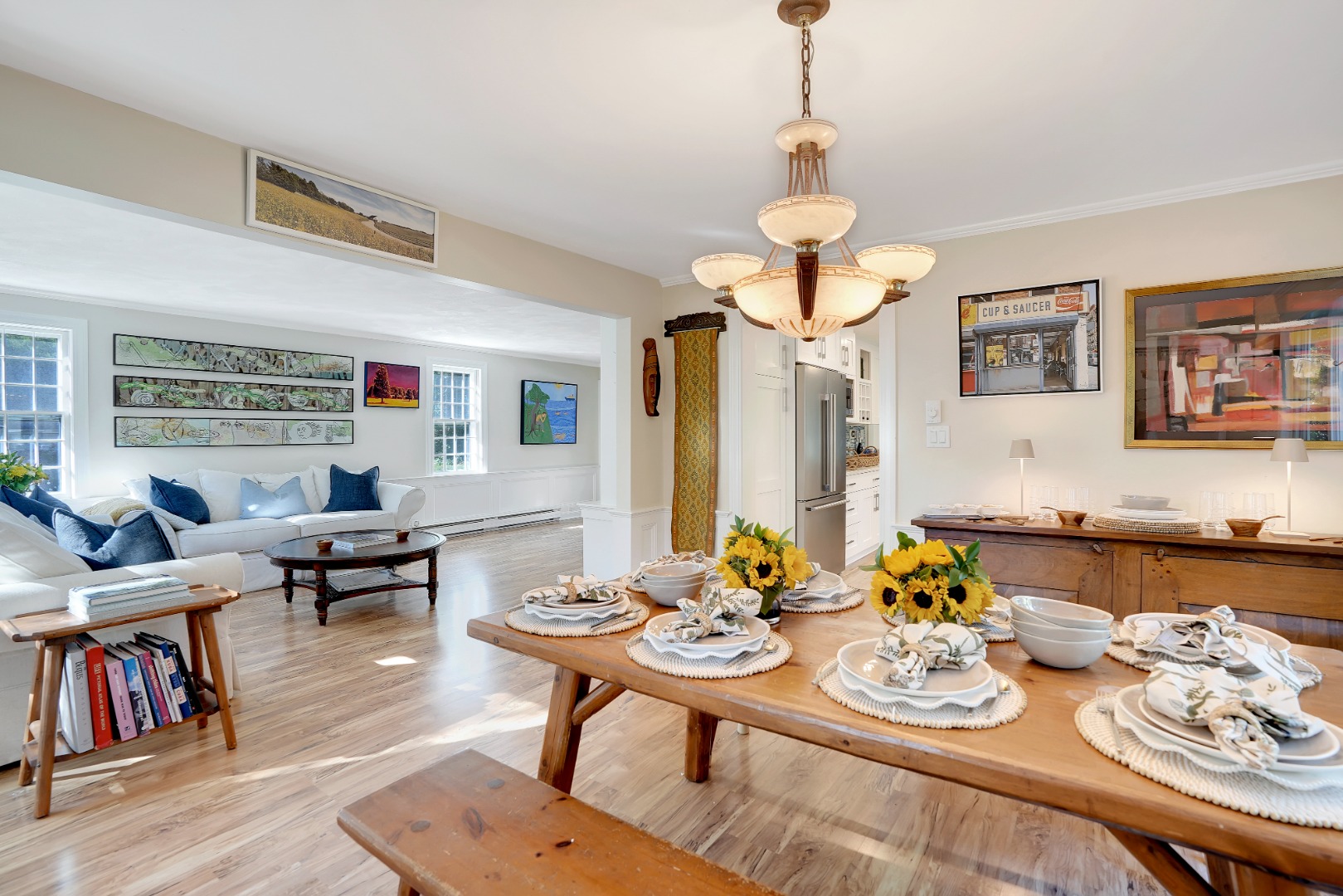 28 Pine Tree Lane Vineyard Haven, MA 02568 - Photo 13 of 61 a dining room with furniture a rug and a chandelier