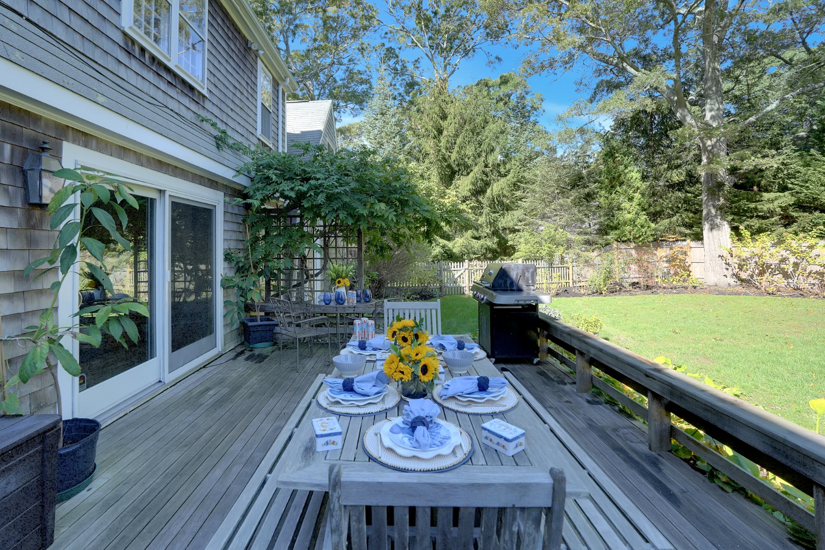 28 Pine Tree Lane Vineyard Haven, MA 02568 - Photo 24 of 61 a view of yard from deck with patio