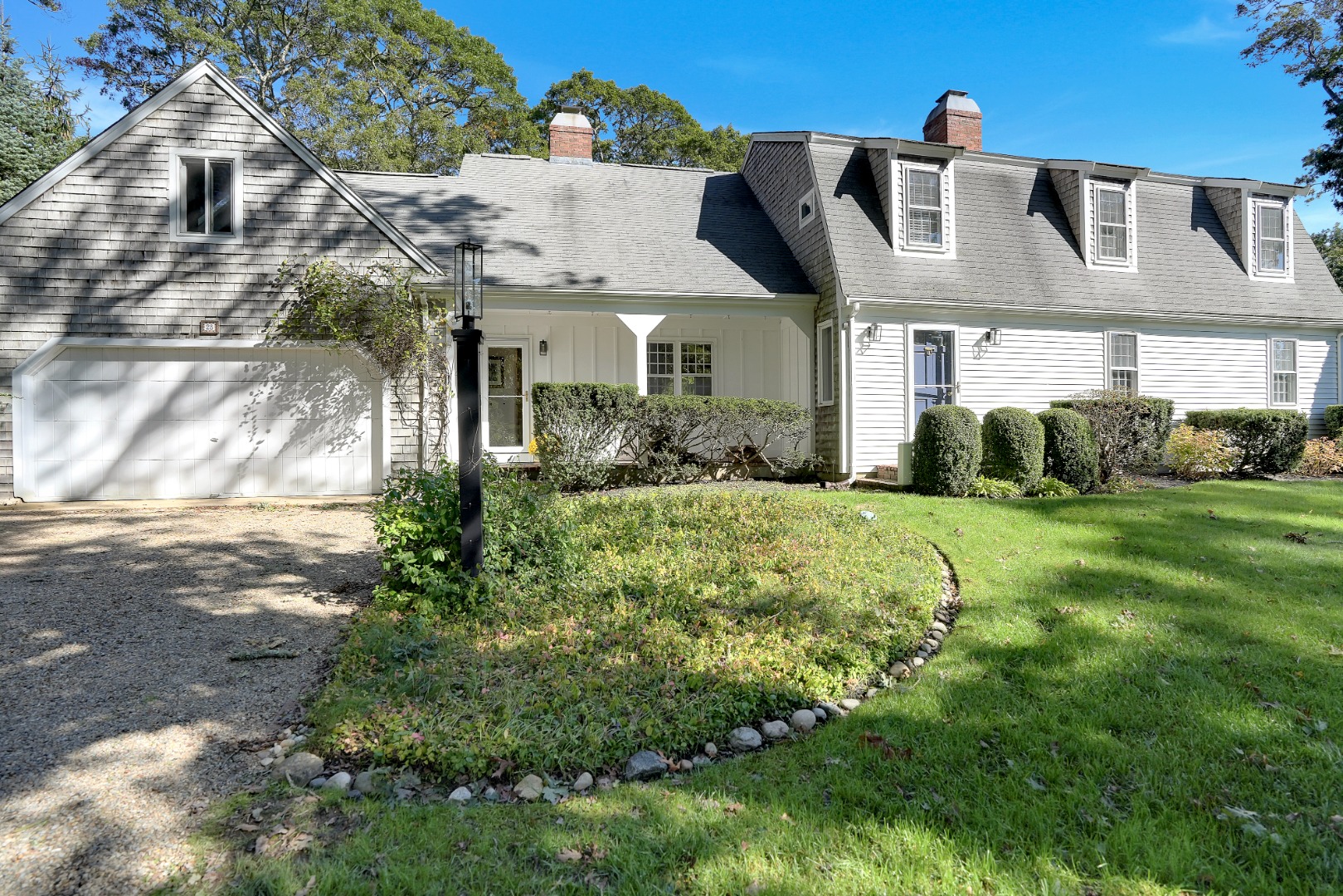 28 Pine Tree Lane Vineyard Haven, MA 02568 - Photo 3 of 61 a front view of a house with a yard