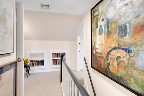 a workspace with furniture and a window