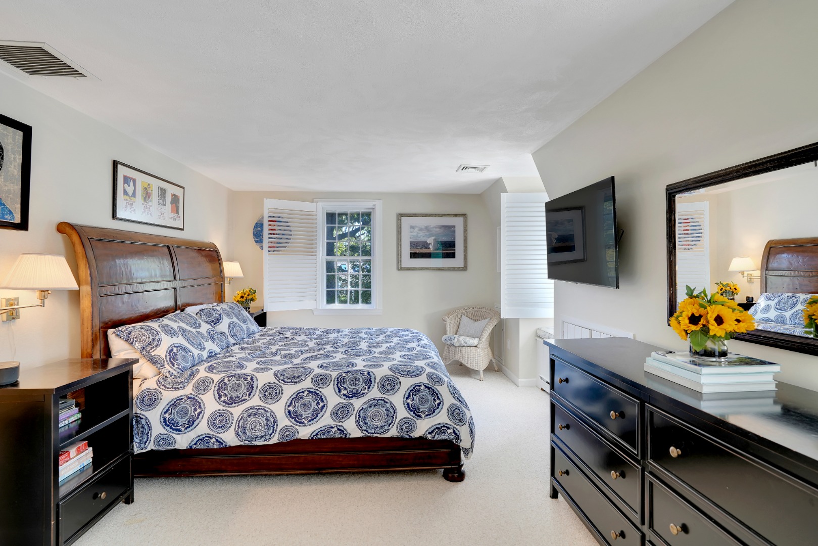 28 Pine Tree Lane Vineyard Haven, MA 02568 - Photo 46 of 61 a bedroom with a large bed and a flat tv screen on dresser