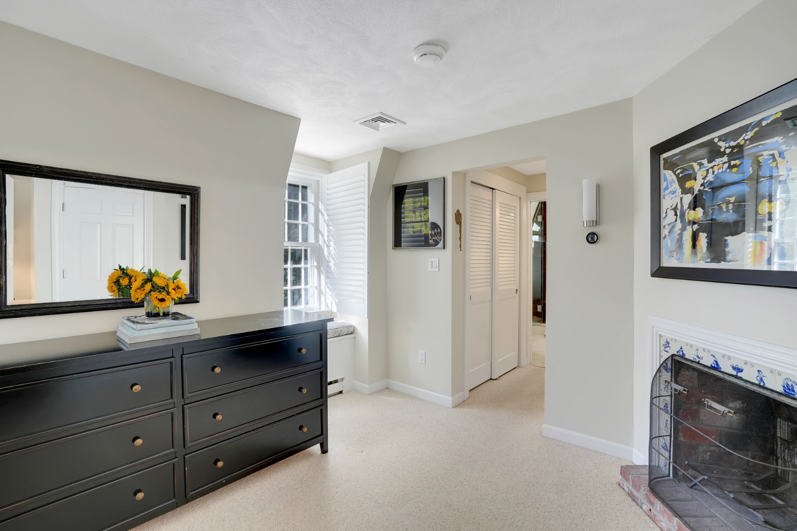 28 Pine Tree Lane Vineyard Haven, MA 02568 - Photo 49 of 61 a living room with painting on the wall and a fireplace