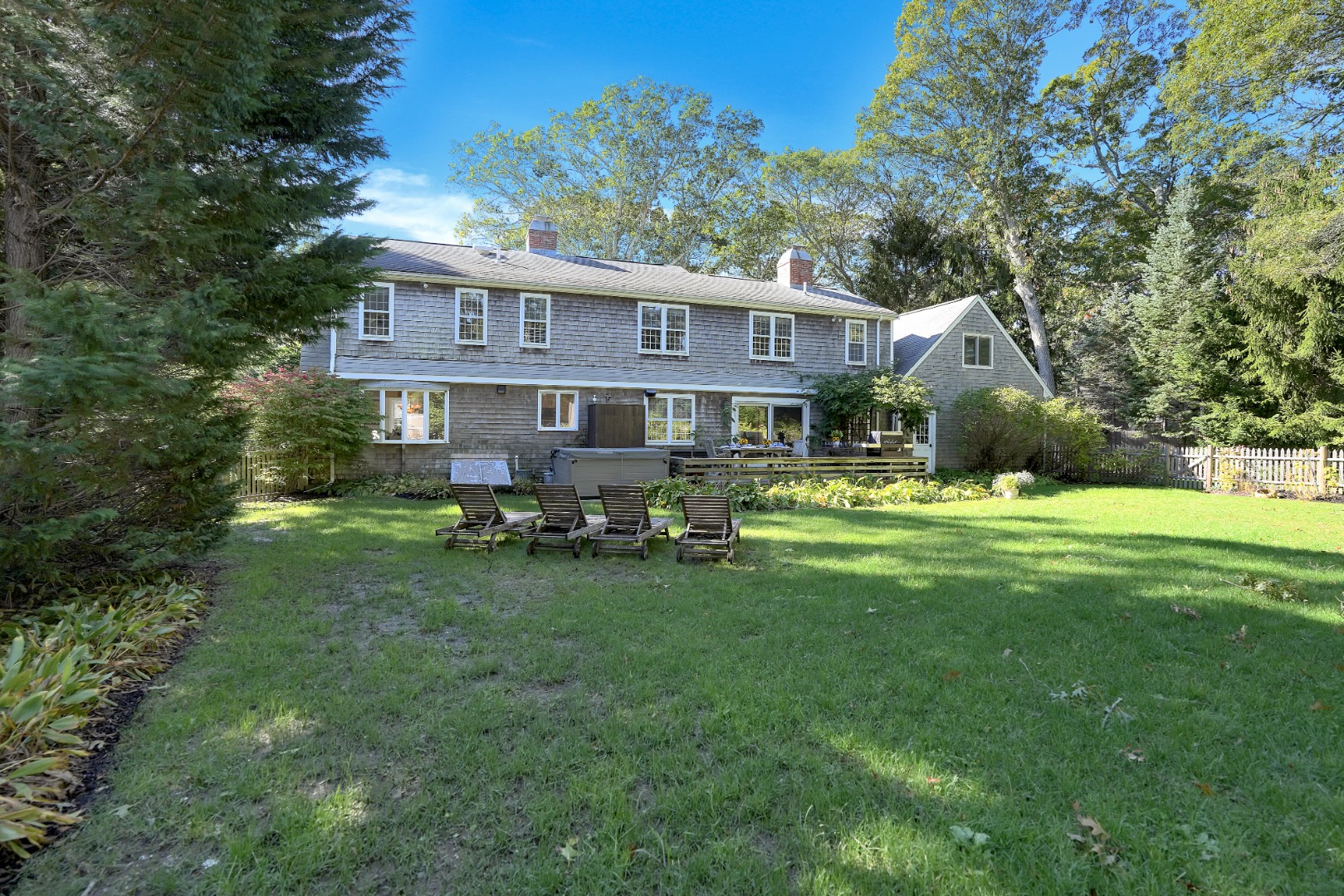 28 Pine Tree Lane Vineyard Haven, MA 02568 - Photo 55 of 61 a front view of a house with yard and green space