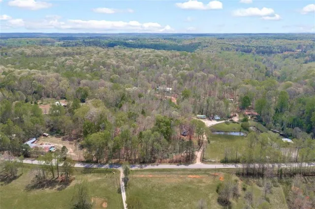 a view of outdoor space with signage and flags