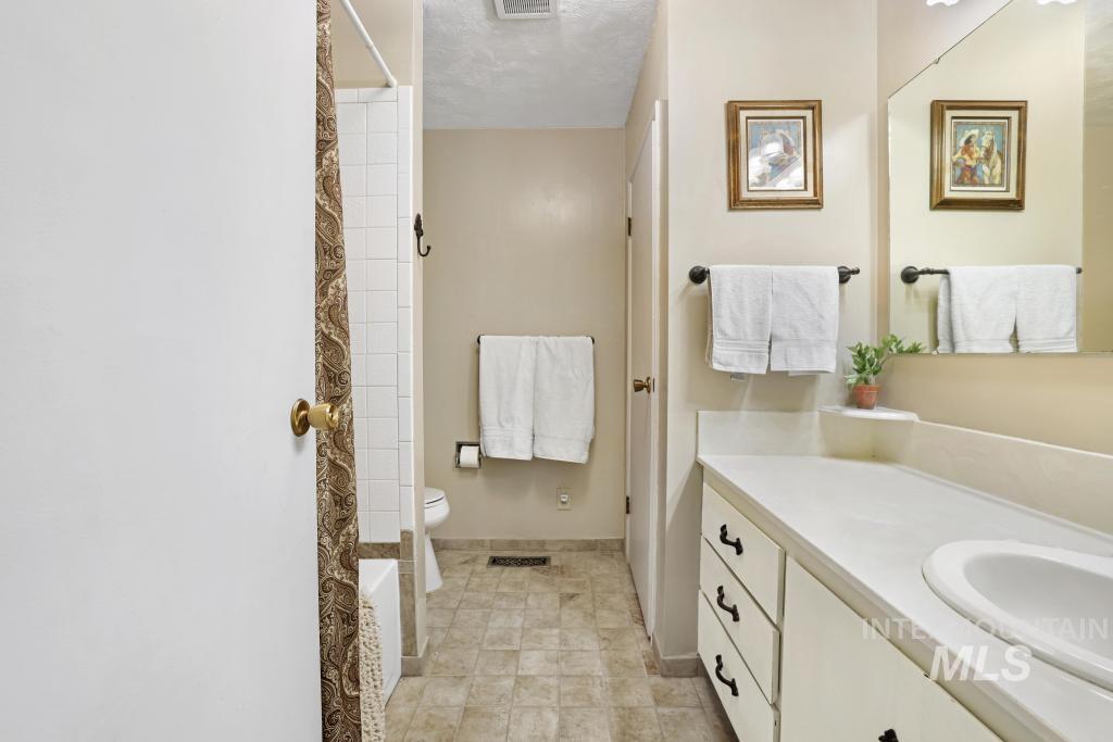 213 Sage Road West Jerome, ID 83338 - Photo 32 of 50 Bathroom featuring vanity and toilet