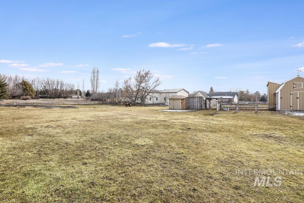 213 Sage Road West Jerome, ID 83338 - Photo 44 of 50 View of yard featuring a storage shed