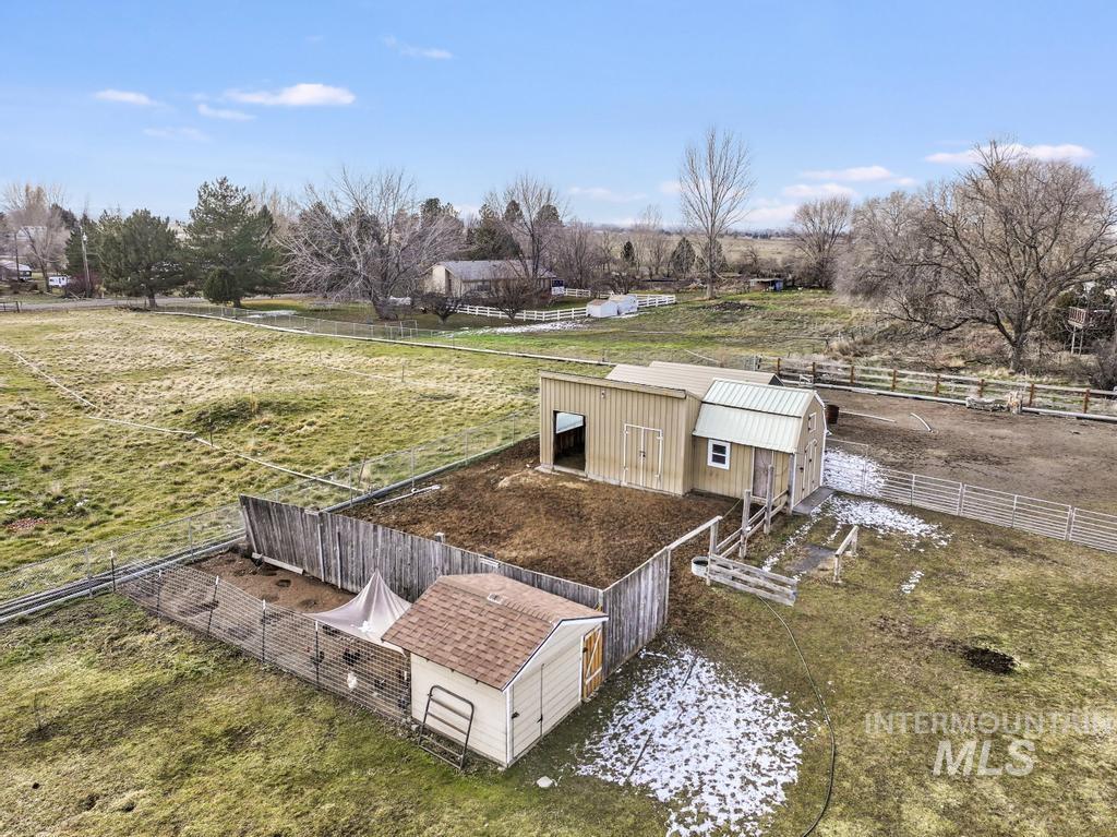 213 Sage Road West Jerome, ID 83338 - Photo 47 of 50 View of yard with an outdoor structure and a view of rural / pastoral area