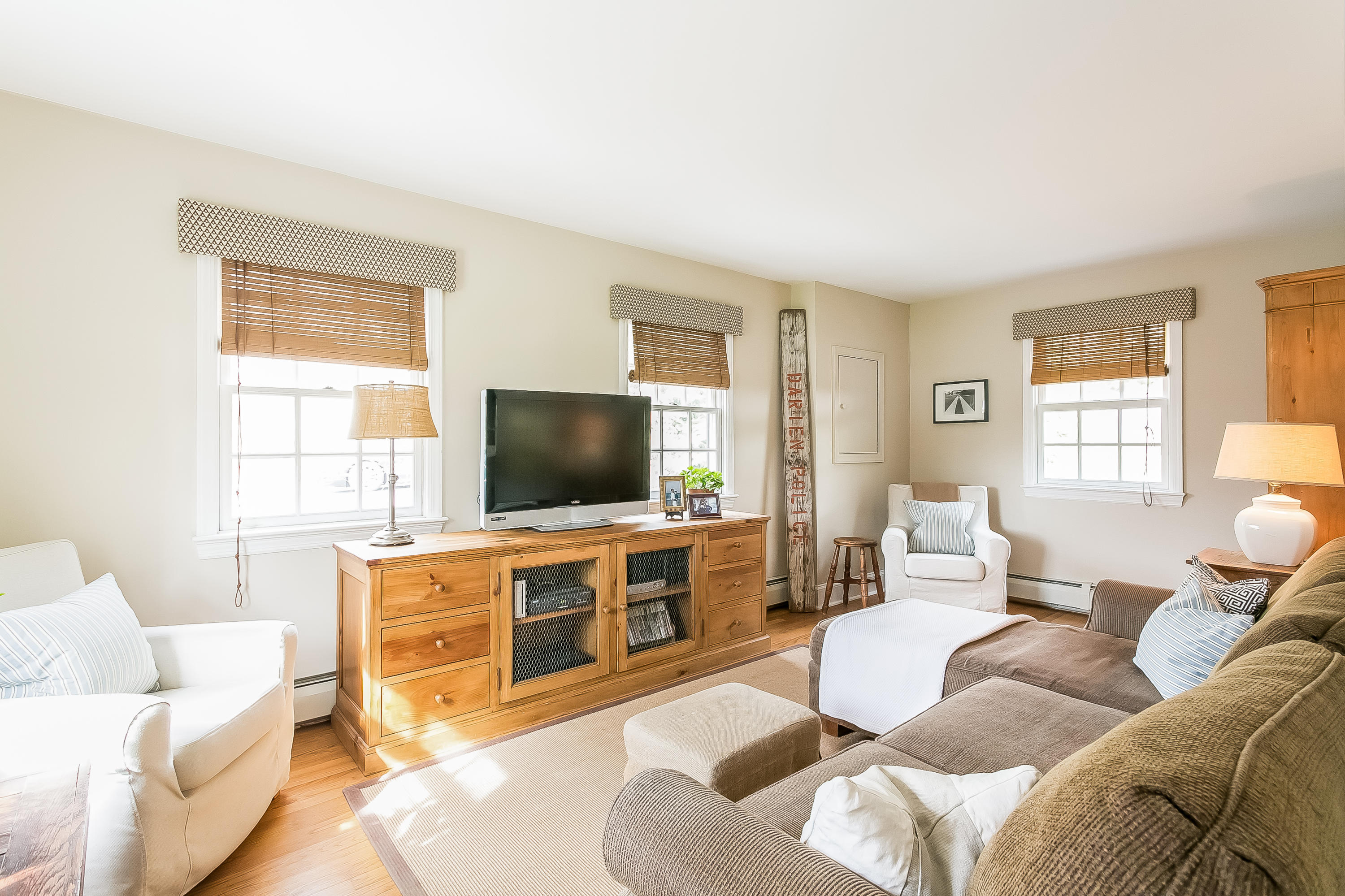 2 Miller Road Darien, CT 06820 - Photo 14 of 28 a living room with furniture and a flat screen tv