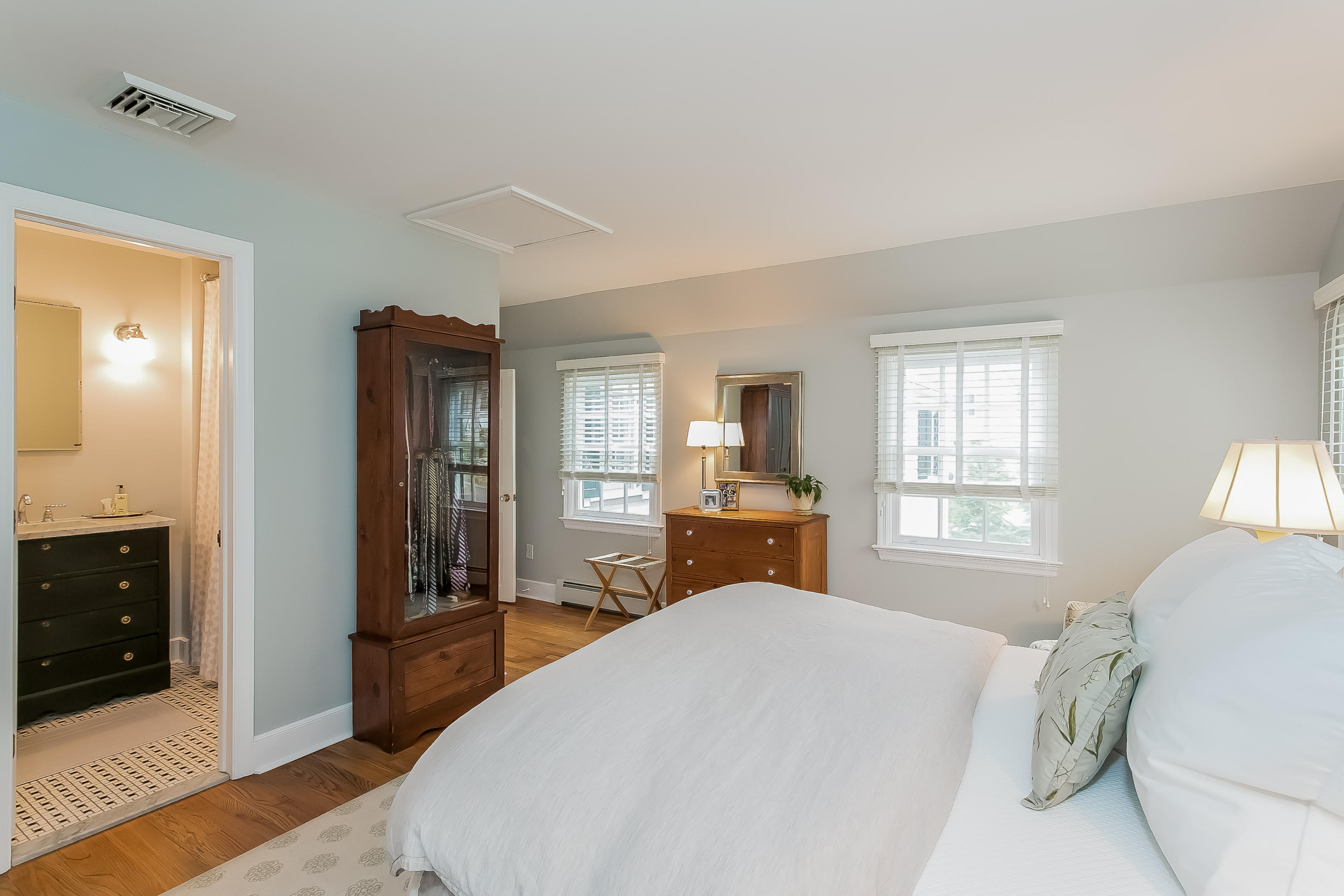 2 Miller Road Darien, CT 06820 - Photo 17 of 28 a bedroom with a bed and a view of bathroom