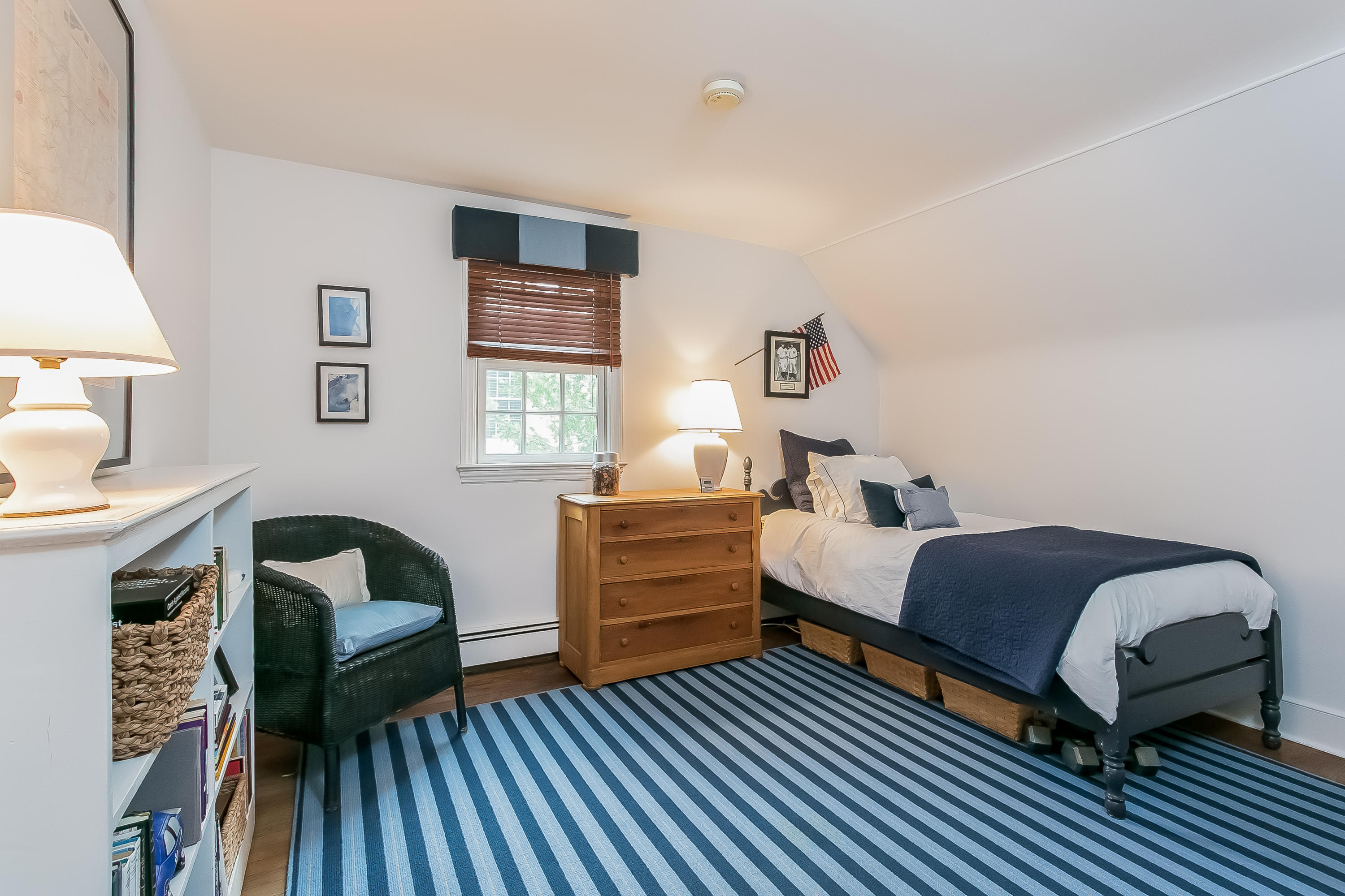 2 Miller Road Darien, CT 06820 - Photo 18 of 28 a bedroom with a bed and a window
