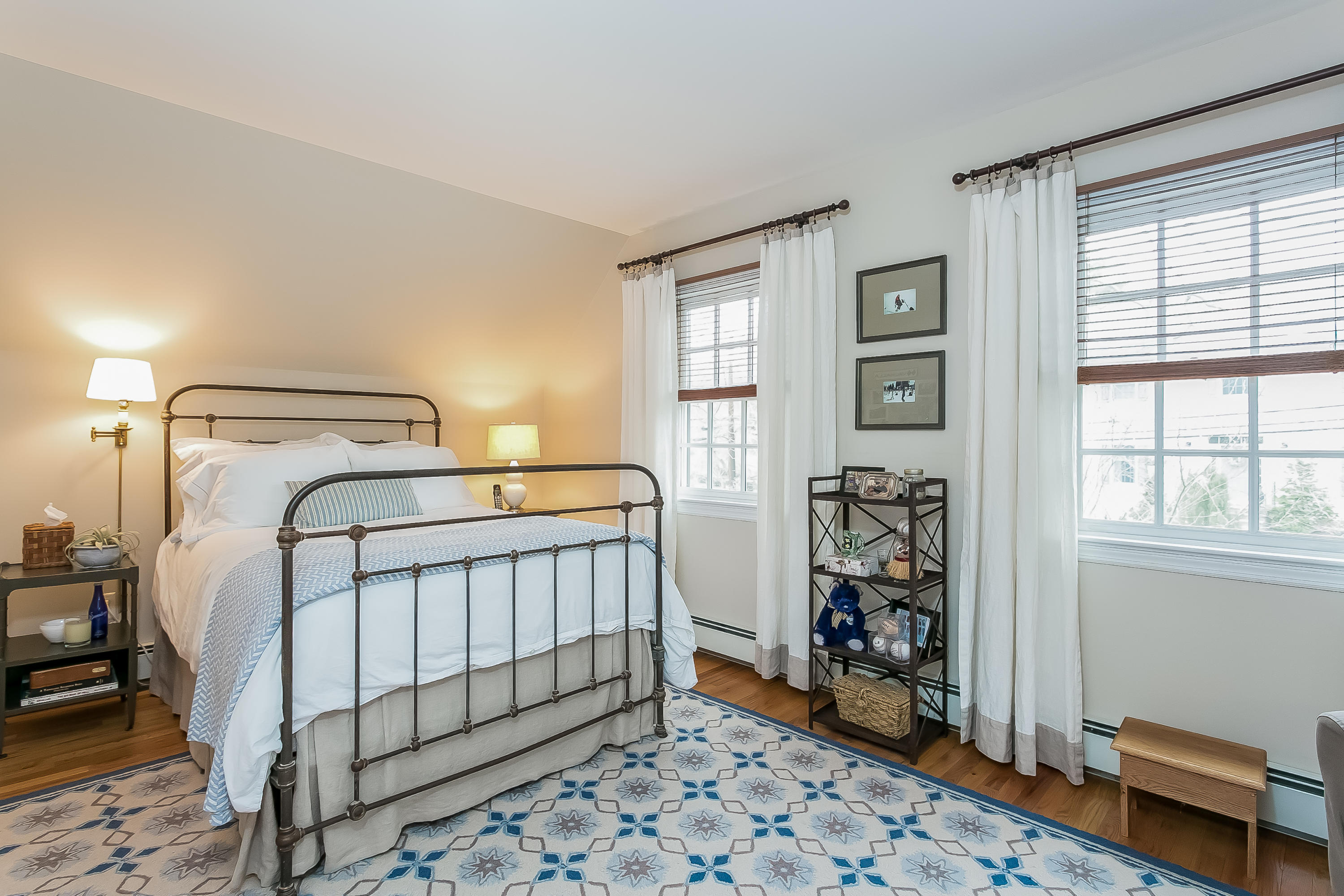 2 Miller Road Darien, CT 06820 - Photo 19 of 28 a bedroom with a bed and a window