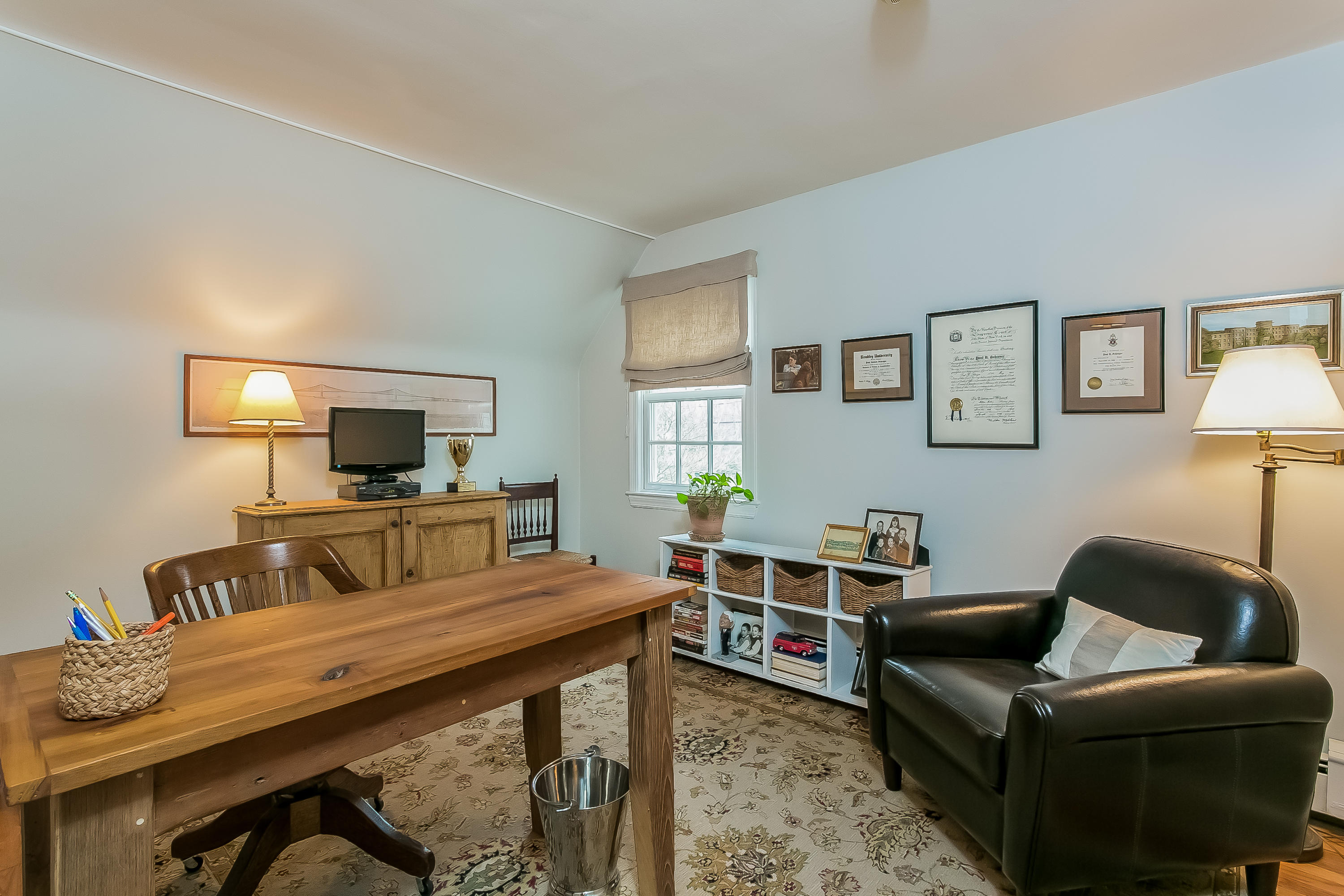 2 Miller Road Darien, CT 06820 - Photo 23 of 28 a living room with furniture and a wooden floor