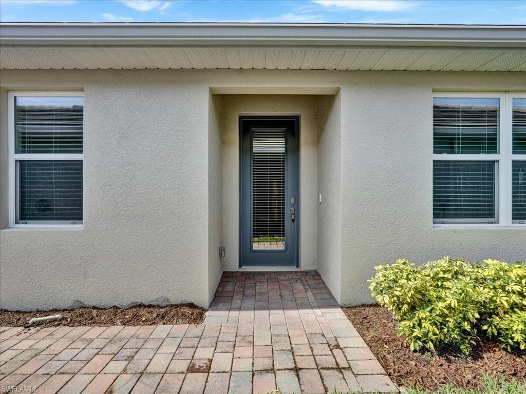 999 Enbrook Loop Naples, FL 34114 - Photo 36 of 50 a view of a house with a window