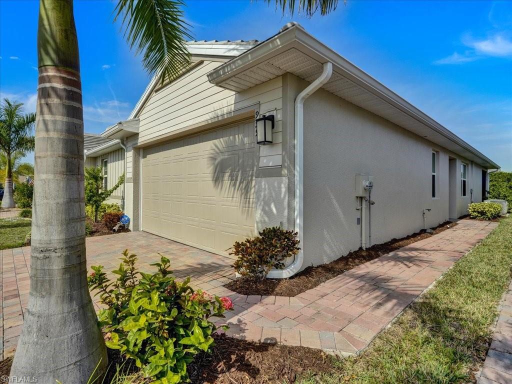 999 Enbrook Loop Naples, FL 34114 - Photo 41 of 50 a front view of a house