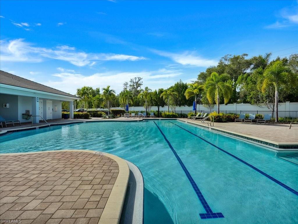 999 Enbrook Loop Naples, FL 34114 - Photo 49 of 50 a view of a house with a big yard