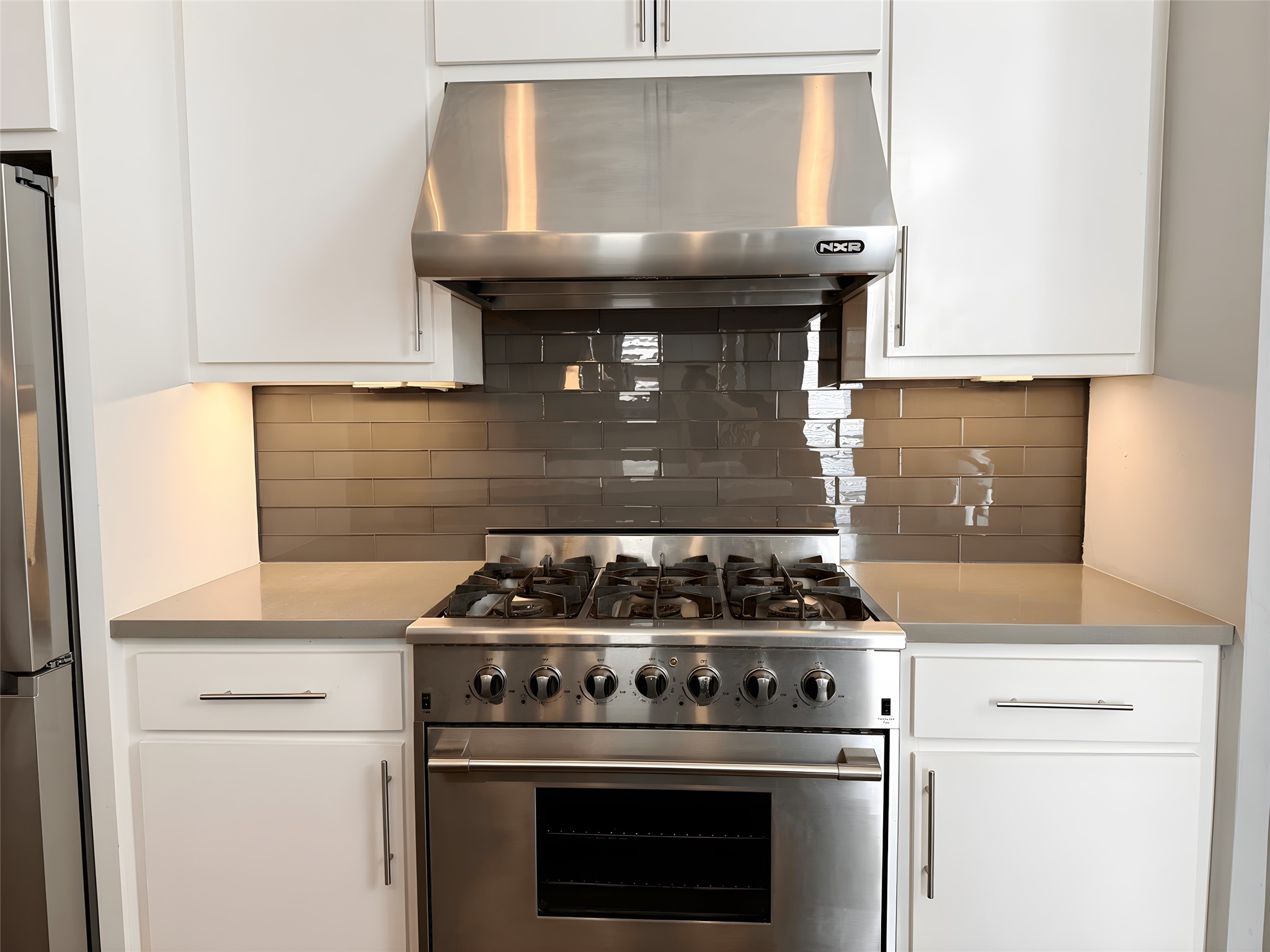 2115 Detering Street Houston, TX 77007 - Photo 6 of 30 a stove top oven sitting inside of a kitchen