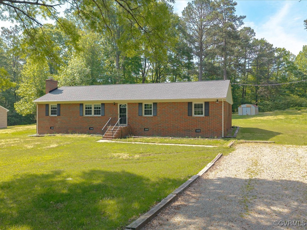 11311 Moravia Road Midlothian, VA 23112 - Photo 2 of 29 a view of an house with backyard space and swimming pool