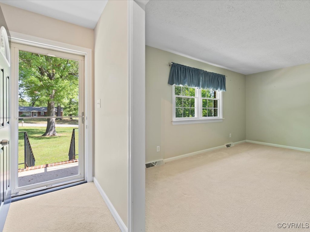 11311 Moravia Road Midlothian, VA 23112 - Photo 4 of 29 an empty room with a window