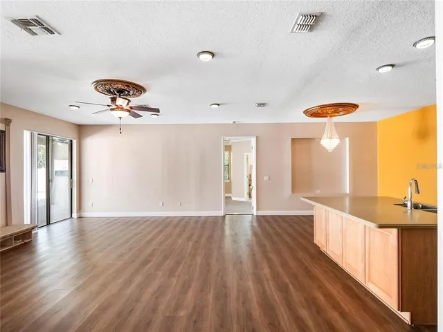 a view of an empty room and window