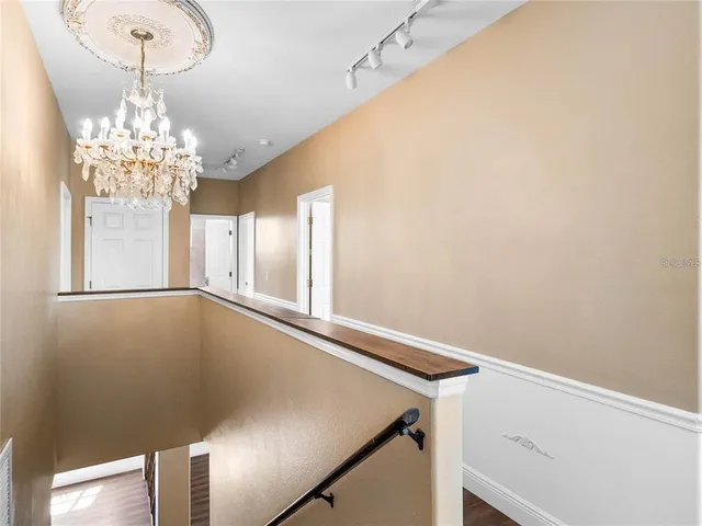 a view of a room with windows