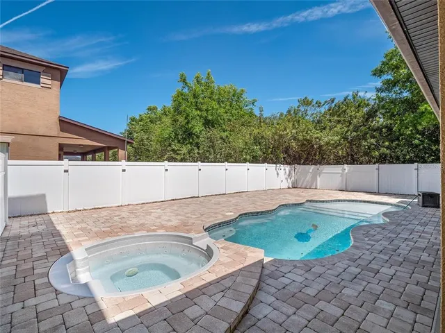 a view of a bathtub and fire pit